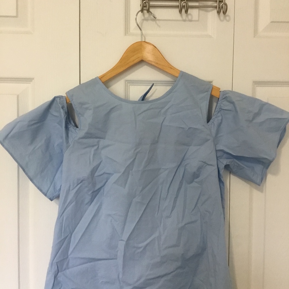 Blouse with draped sleeves and bow in back